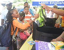 Backpacks being distributed